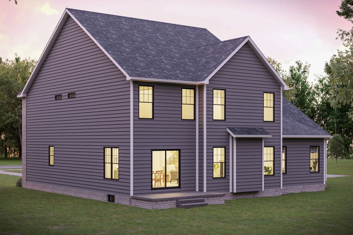 Rear exterior view of a 4-bed traditional house with gray siding, white trim, and a two-story great room.
