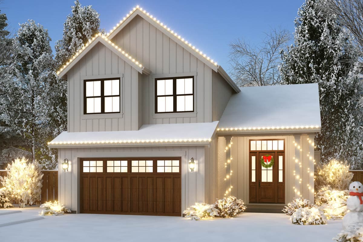House plan exterior, two stories, gabled roof, double garage, covered porch with holiday lights and wreath.
