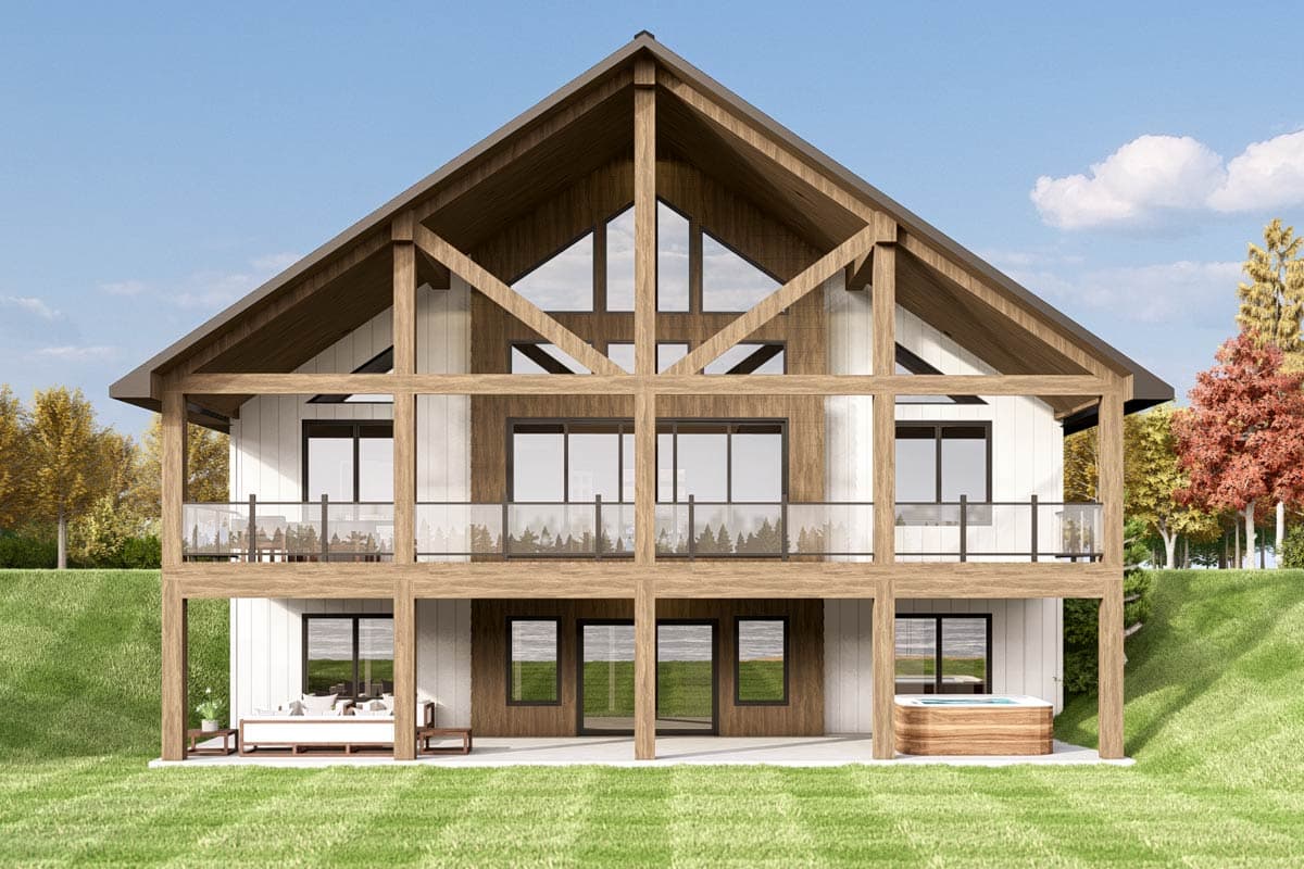 Modern A-frame house plan exterior with exposed timber beams, multiple balconies, and a lower-level patio with a hot tub.