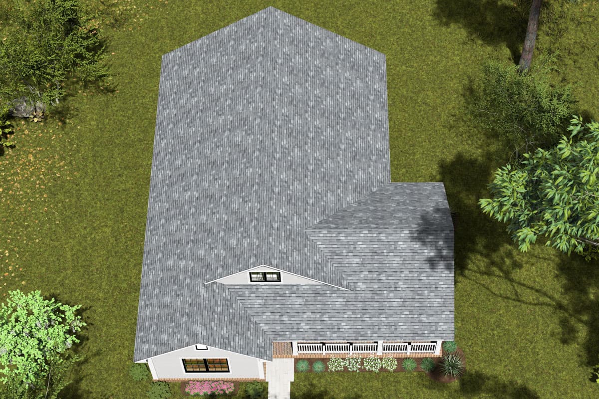 House plan exterior: Two-story home with intersecting gable rooflines, front porch, and dormer window.