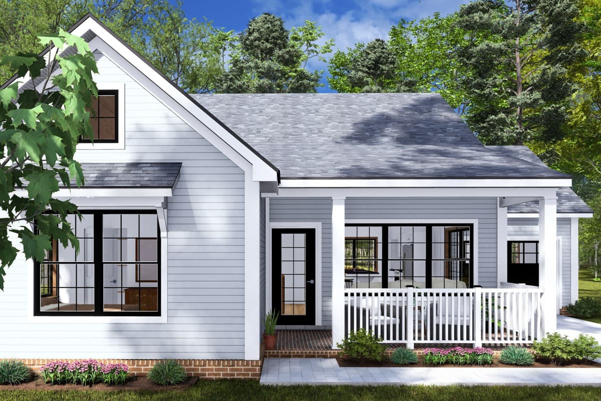 House plan exterior featuring a gabled front, covered porch with white railings, and multiple pane windows. Modern Farmhouse style.