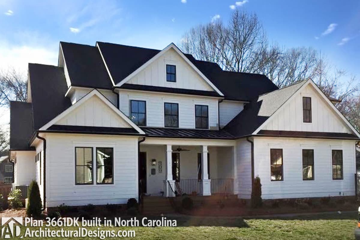 Modern Farmhouse style house plan exterior, two stories, with gables, dormers, and a covered front porch.