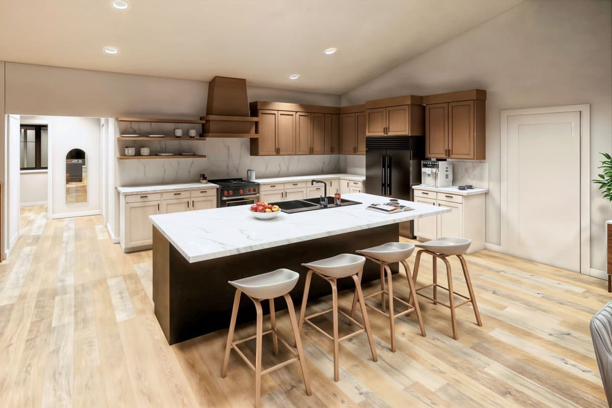 A modern kitchen with a large island and bar stools. Light wood floors complement the dark island and brown cabinets, giving the space a warm feel.