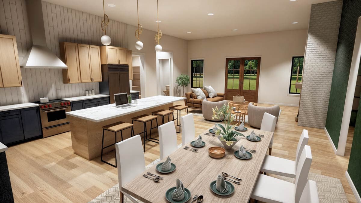 A modern, open-concept kitchen and dining area with a long wooden table set for a meal, and a connected living space.