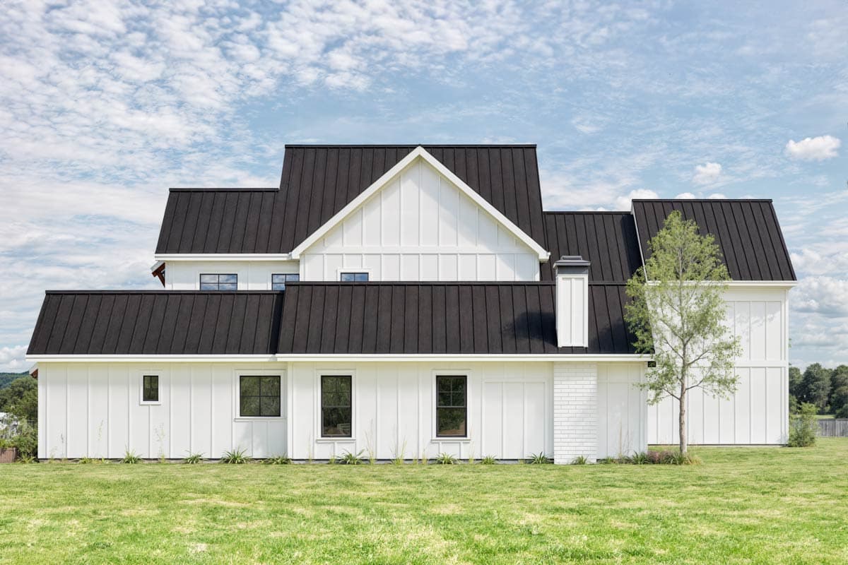 House plan exterior: Modern Farmhouse style with standing seam metal roof, board and batten siding, and gabled dormers.