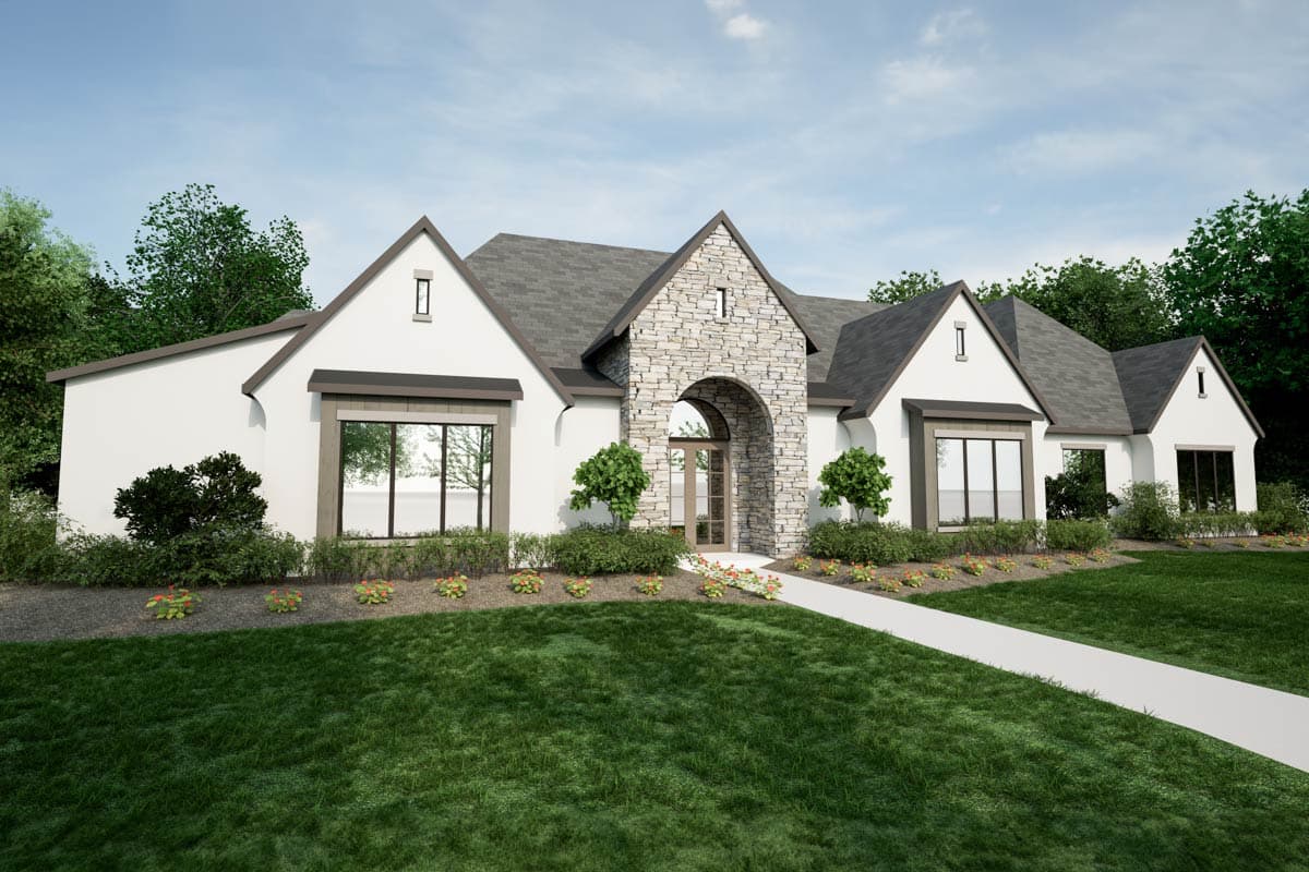 House plan exterior with stone arched entry, multiple gables, and large windows.