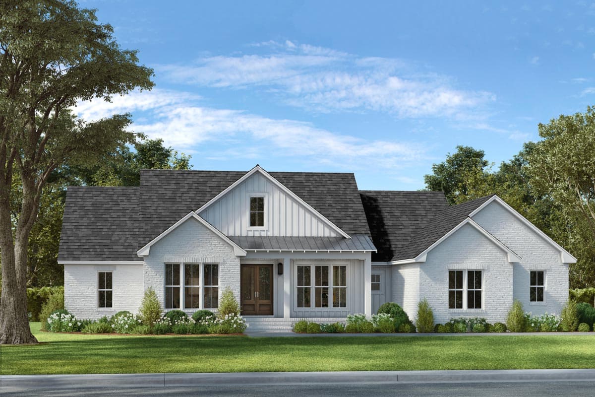 Modern Farmhouse style house plan exterior with white brick, gable rooflines, and a covered front porch with double doors.