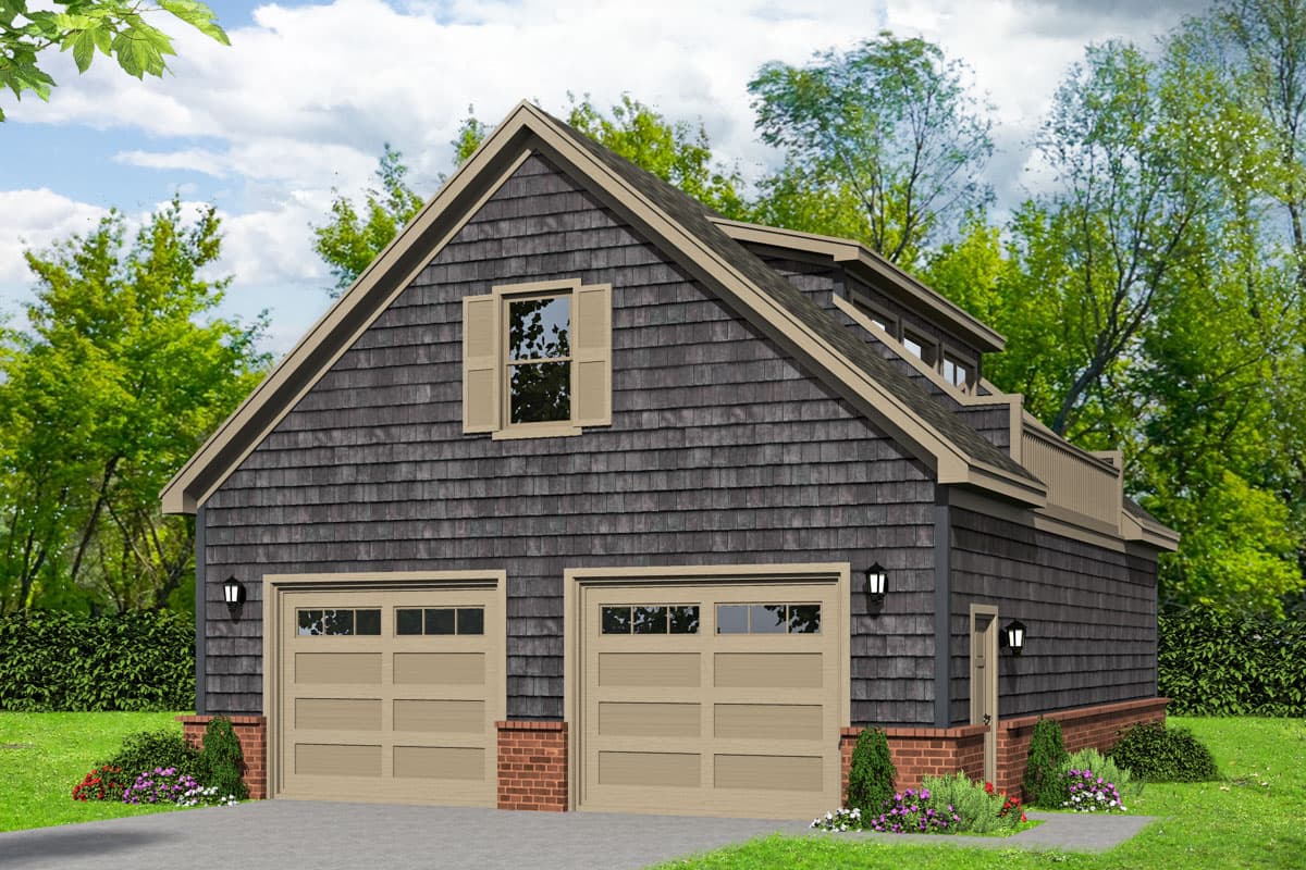 House plan exterior with two-car garage. Gable roof with dormers and small balcony. Dark gray shingle siding with brick accents.