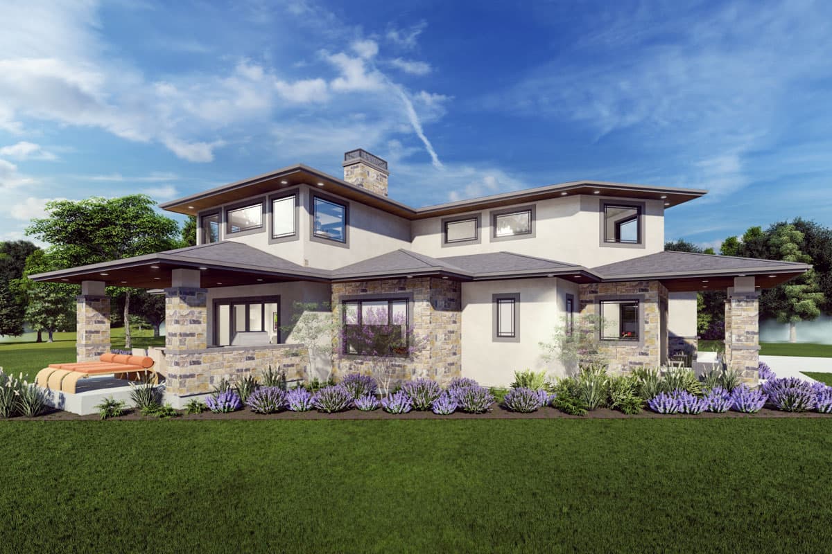 Modern house plan exterior with stone accents, wide eaves, a covered porch supported by stone pillars, and multiple gables.