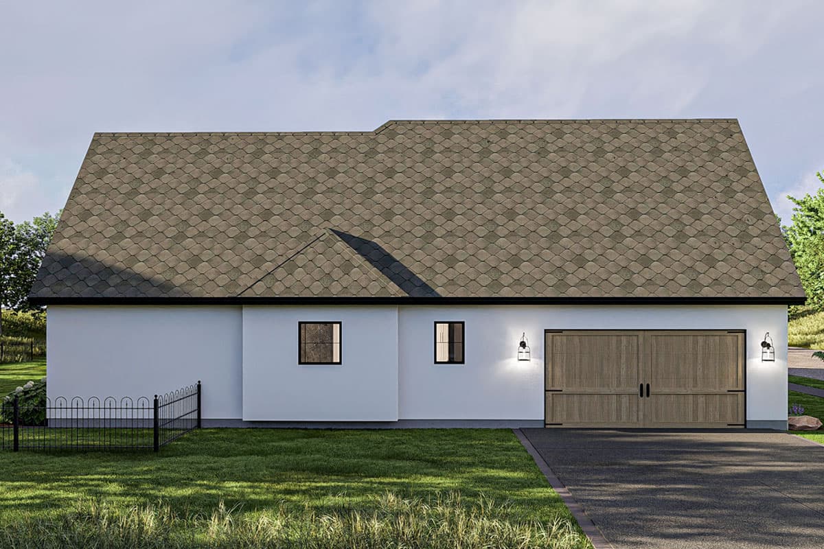 House plan exterior with asphalt shingle roof, white stucco siding, two windows, and double garage doors.