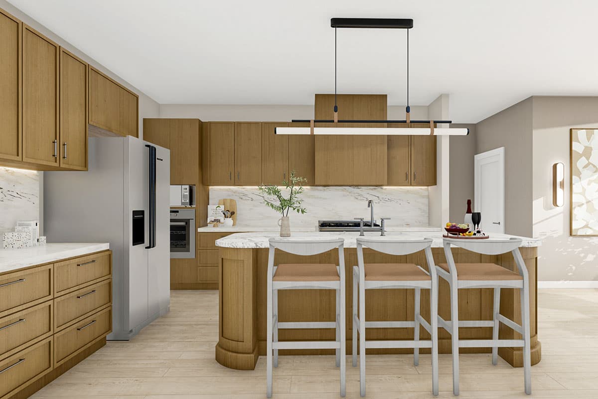 Kitchen interior with light wood cabinetry, marble countertops, island with seating, stainless steel refrigerator, and pendant lighting.