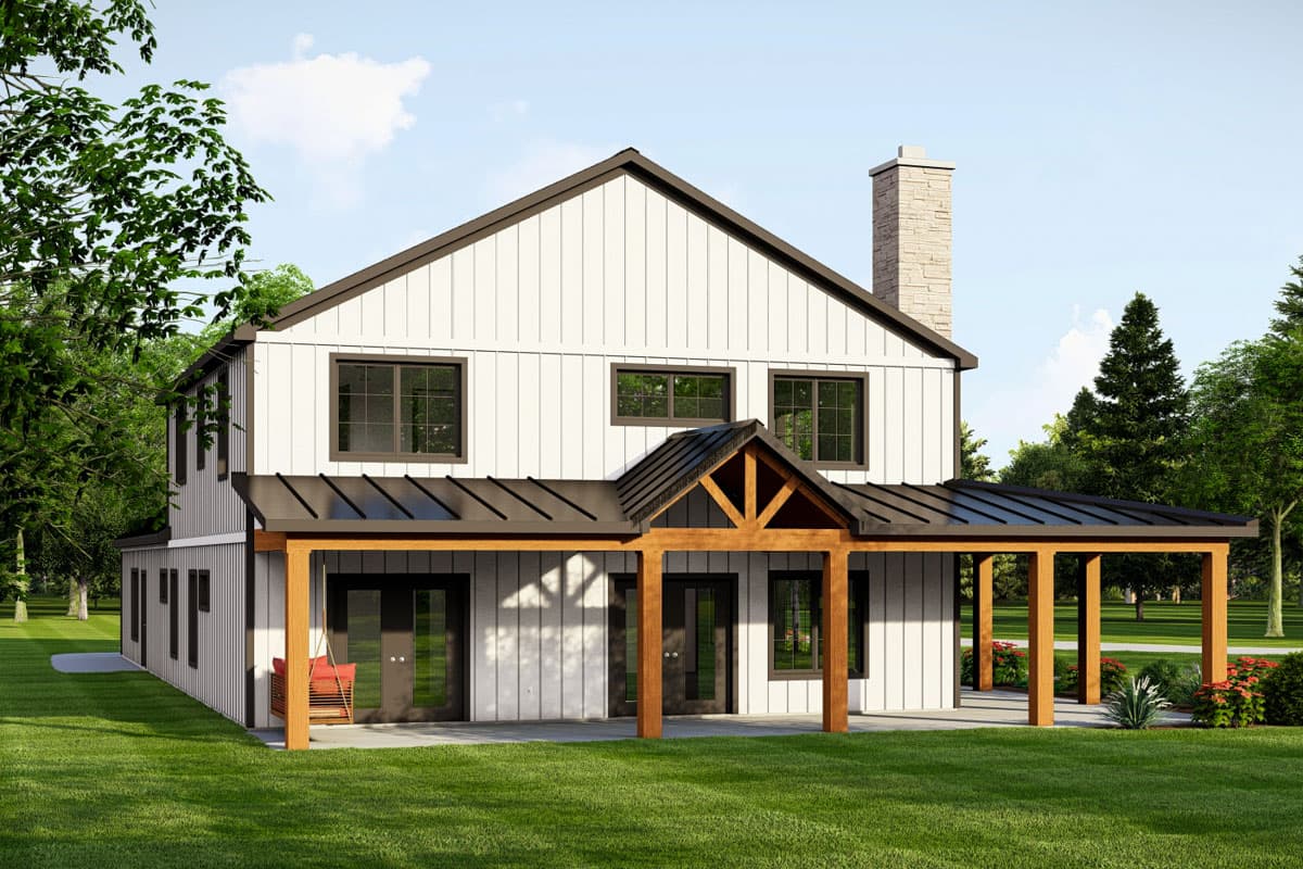 Two-story modern farmhouse exterior with board-and-batten siding, a covered porch with exposed wood beams, and a stone chimney.