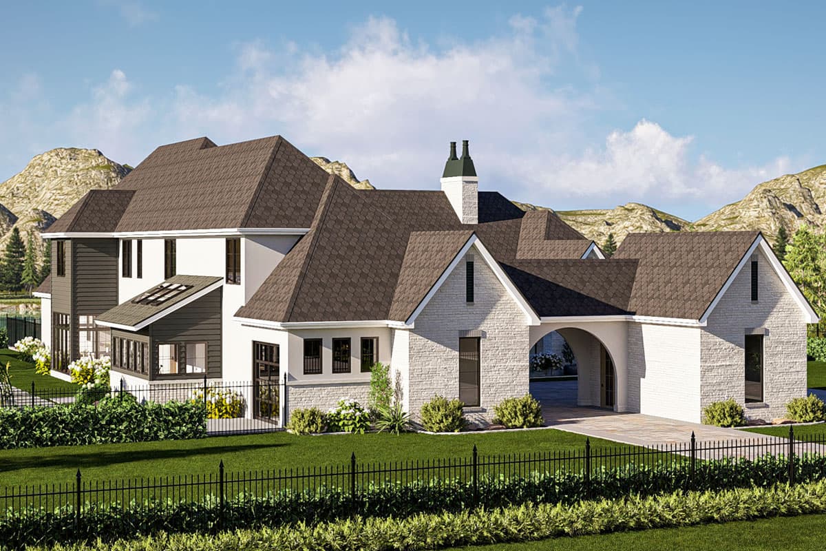 House plan exterior: Two-story modern farmhouse with white brick, dark siding, arched entry, and multiple gables.