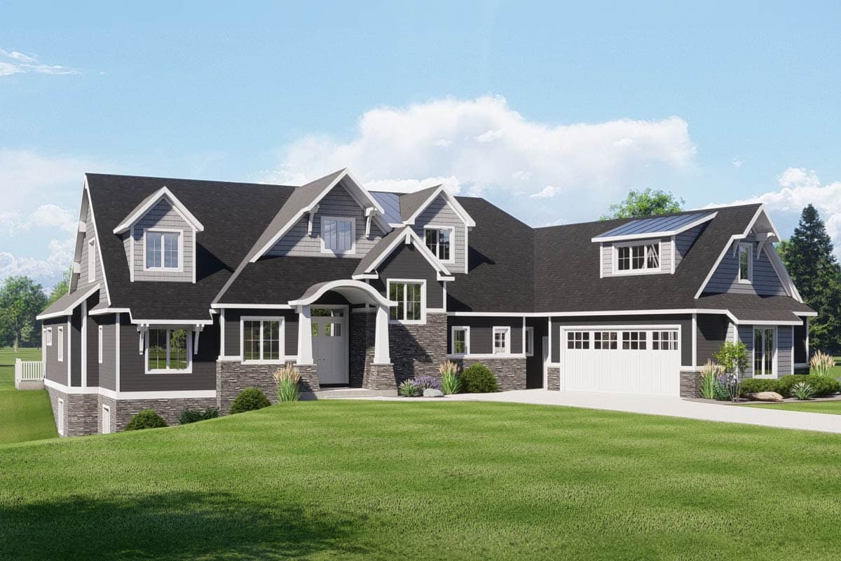 House plan exterior. Two-story Craftsman with multiple gables, dormers, and a prominent roofline. Features stone accents, and an attached garage.