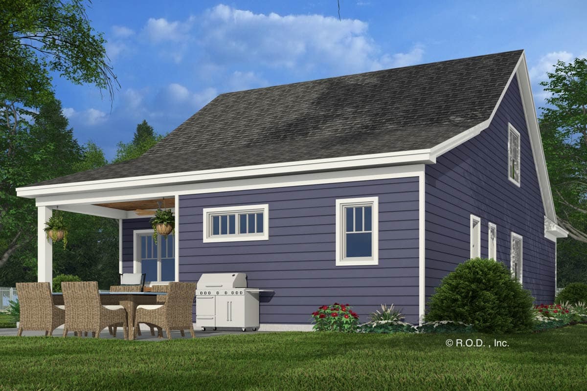 House plan exterior: Blue siding, white trim, covered porch with ceiling fan, visible grill and dining set on patio.