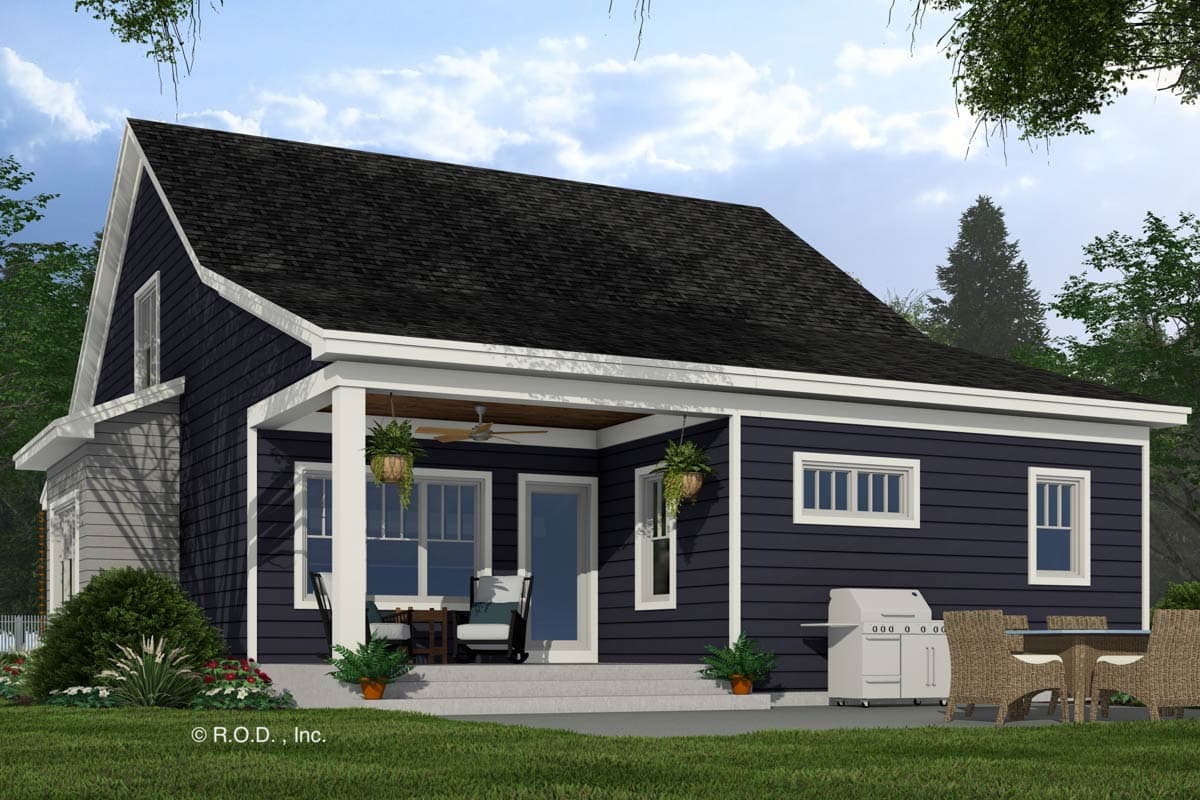 House plan exterior: One-story home with a gabled dormer, covered porch with ceiling fan, and horizontal siding.