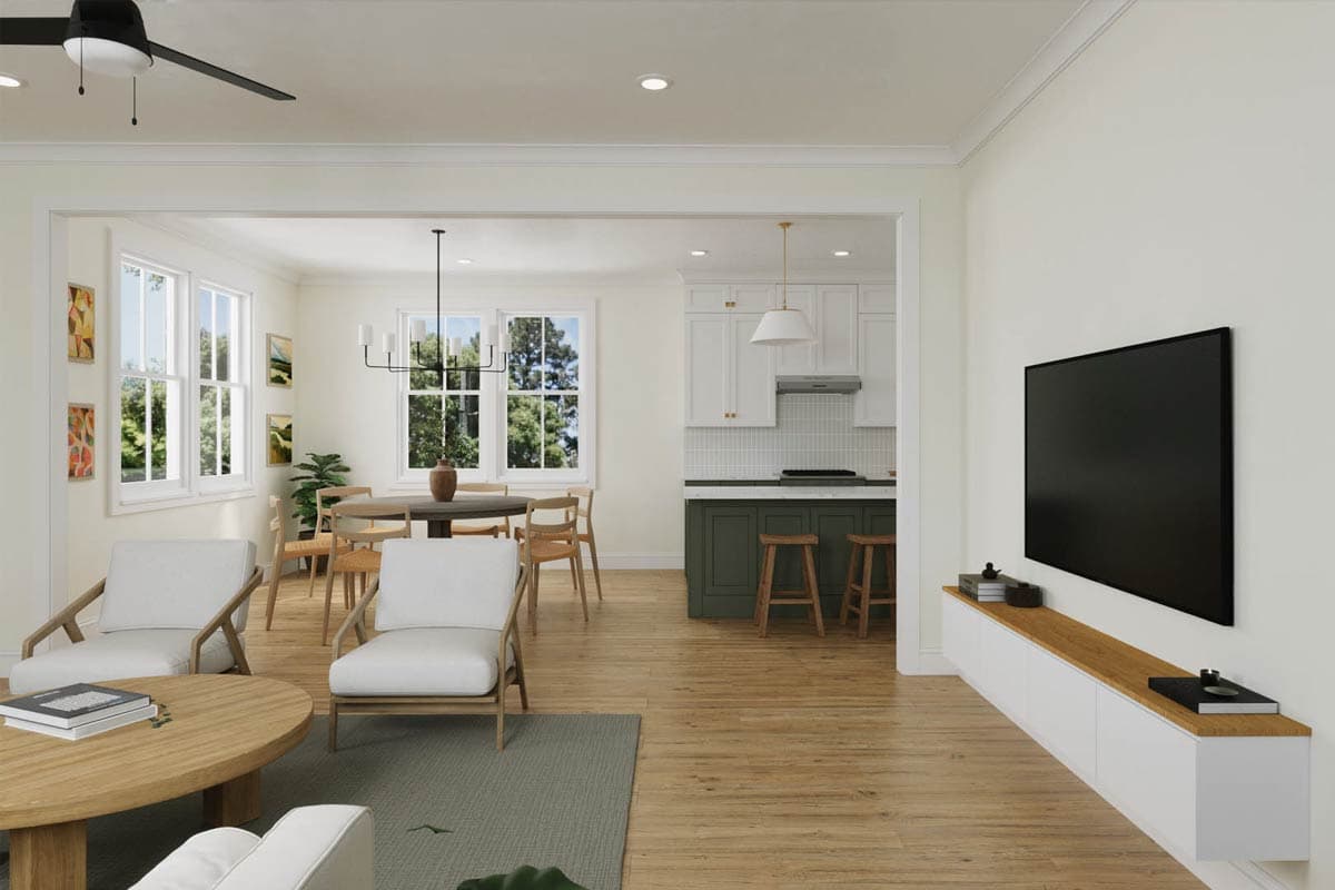 Open-concept living area with dining space, kitchen island, and entertainment wall.