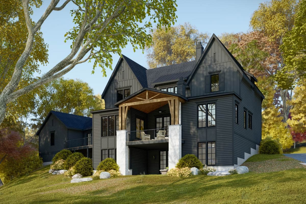 Modern Farmhouse house plan exterior with dark siding, gables, a covered porch with timber beams, and a two-car garage.