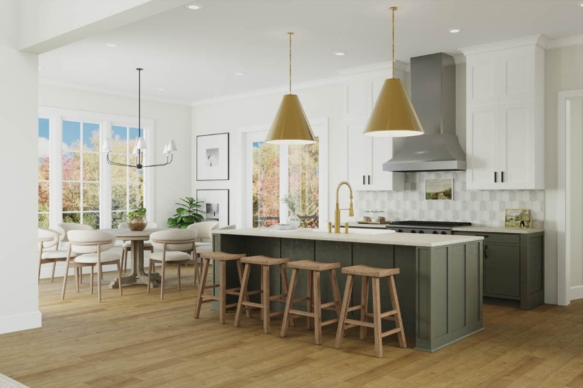 Kitchen and dining area with island, pendant lights, dining table, chairs, and large windows.