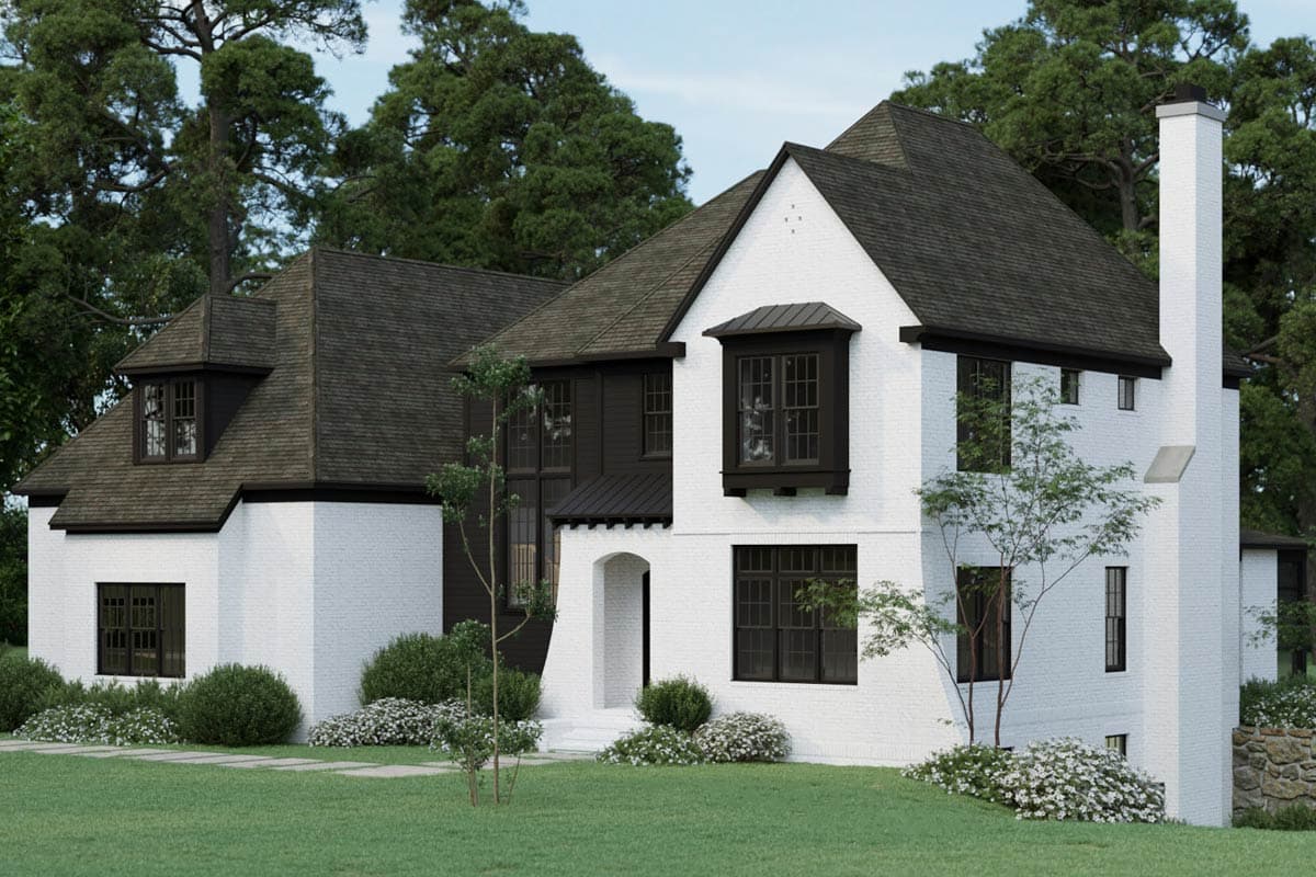 House plan exterior rendering: Tudor style, white brick, dark gables, bay window, and prominent chimney.