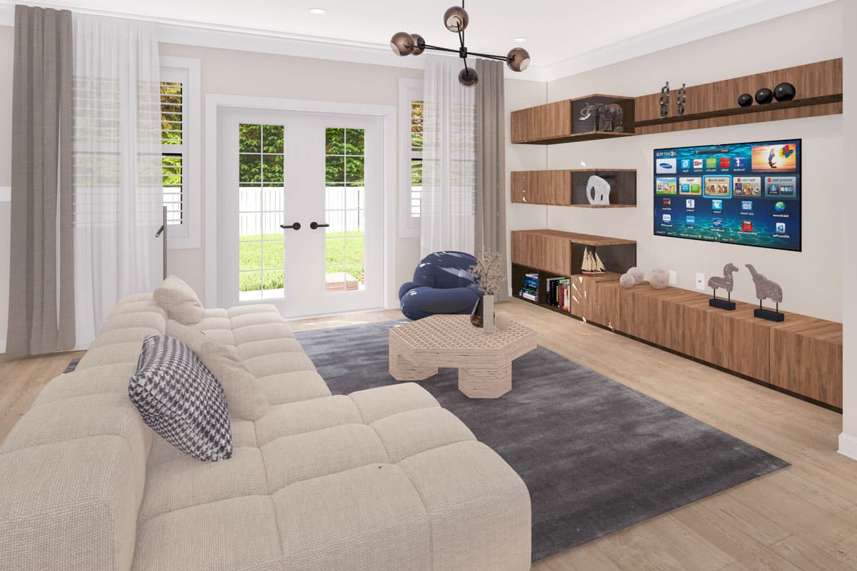 Living room with sectional sofa, hexagonal coffee table, modern media console, and double doors leading outdoors.