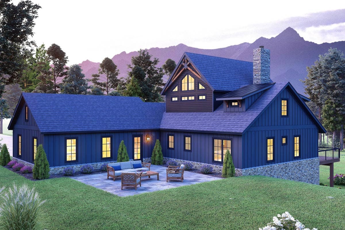 House plan exterior: Modern Farmhouse style with stone foundation, multiple gables, prominent gable dormer, and large stone chimney.