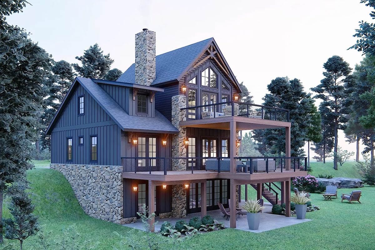 Modern Farmhouse house plan exterior with stone accents, board and batten siding, multiple levels of decking, and a prominent gable.