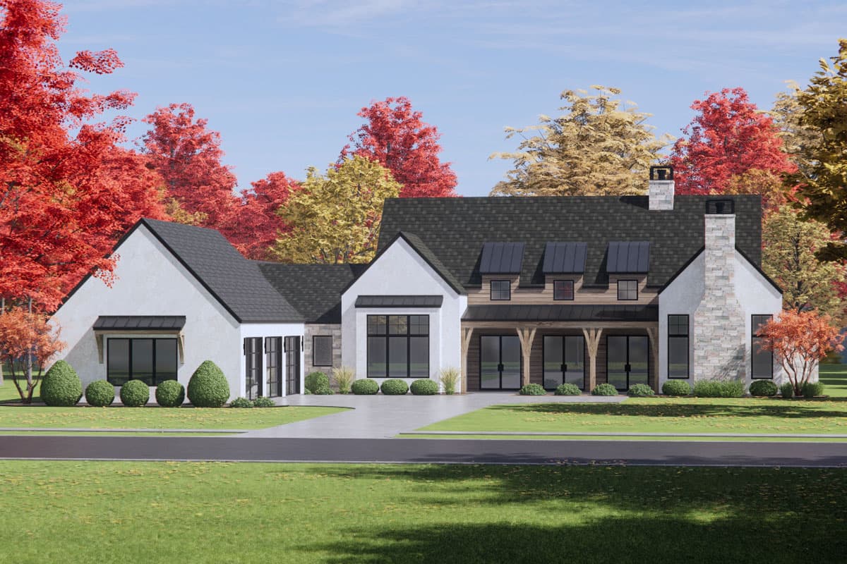 Modern Farmhouse house plan exterior with white stucco, stone accents, gable rooflines, dormers, and covered porch.