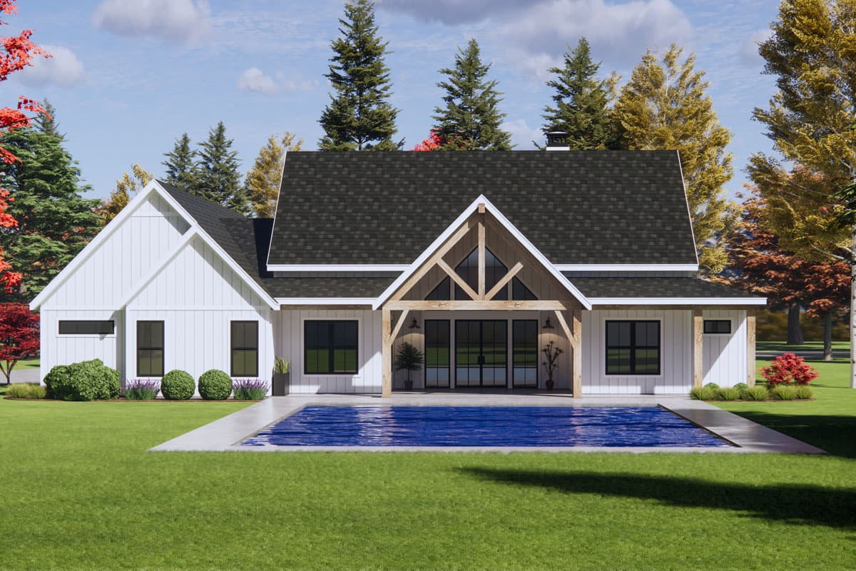 Modern Farmhouse house plan exterior with gables, exposed beams over patio, and a pool.