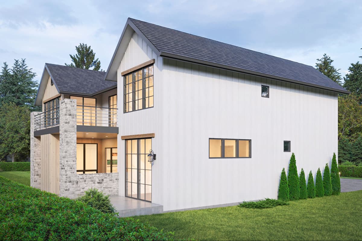House plan exterior: modern style, two stories, white vertical siding, stone base, metal balcony, gabled roof.