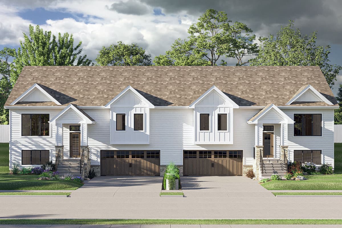 House plan exterior featuring a two-story farmhouse style with gabled dormers and a two-car garage. Porches are near the front entry doors.