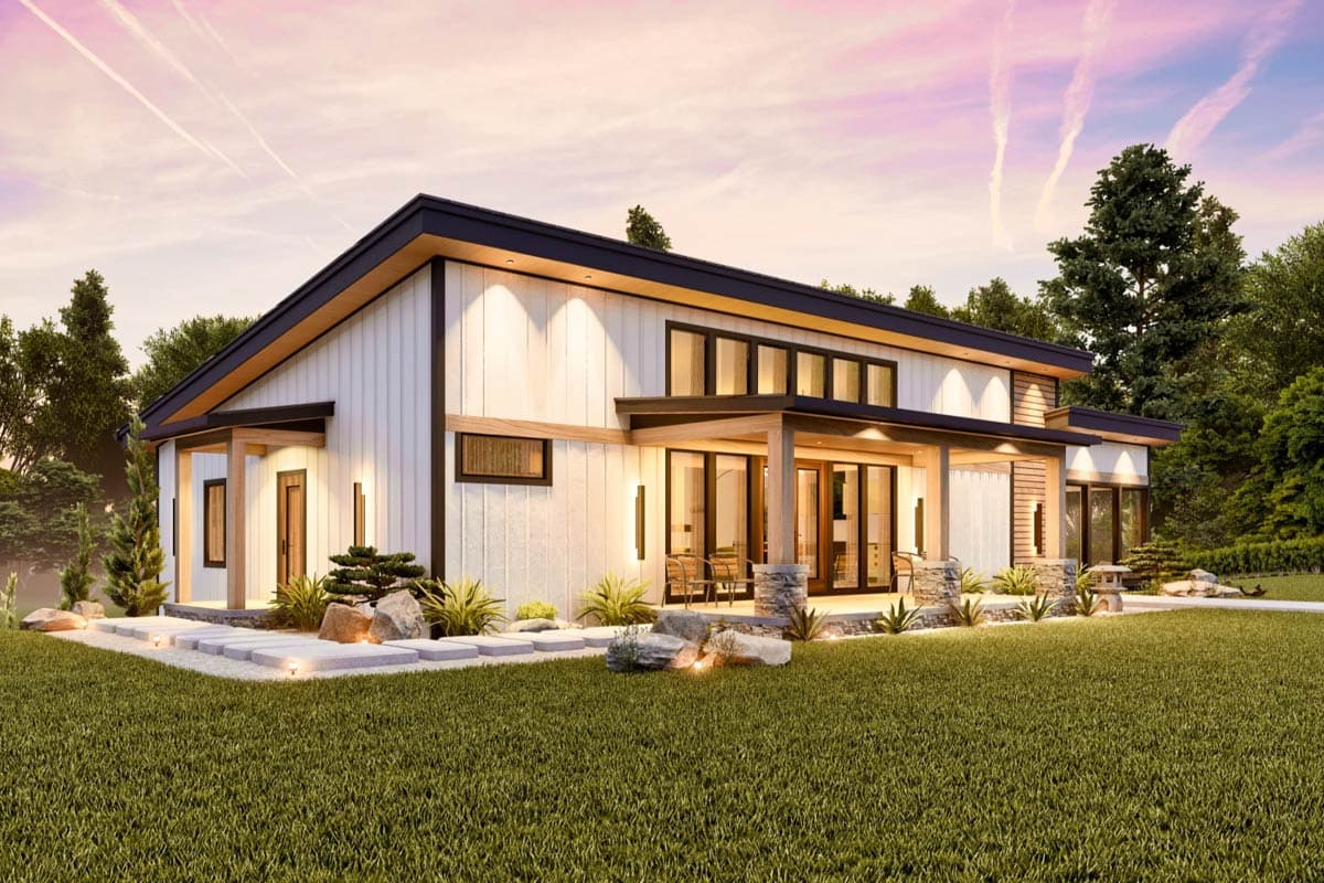 Modern house plan exterior with a low-pitched gable roof, white vertical siding, covered porch with stone columns, and large windows.
