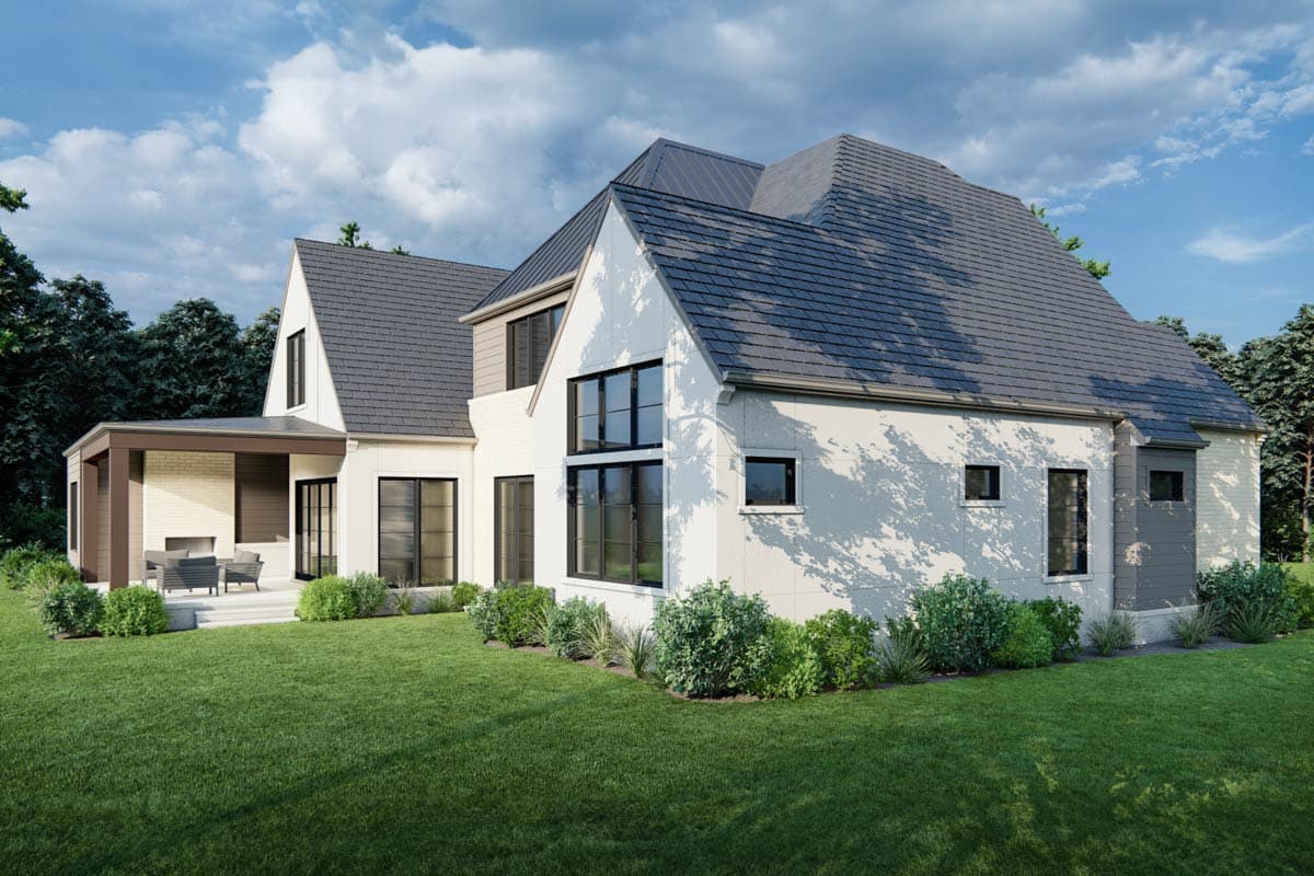 House plan exterior: Two-story Modern Farmhouse with gables, metal roof, covered porch with fireplace, and large windows.