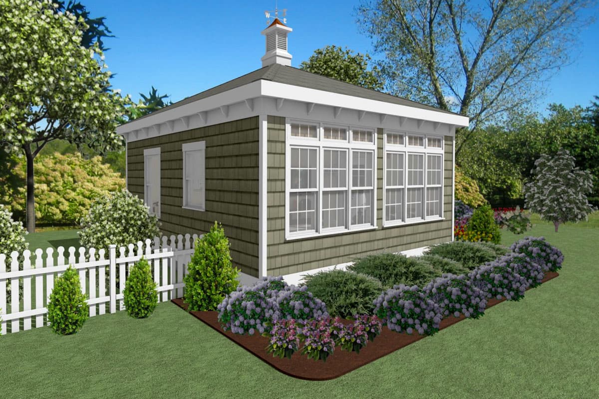 House plan exterior: one-story cottage with shingle siding, gable roof, and multiple windows.