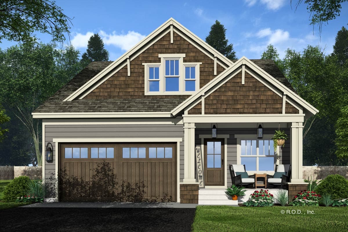 House plan exterior featuring a Craftsman style. The one-story house has a front porch with a gable roof, shake siding, and a two-car garage.