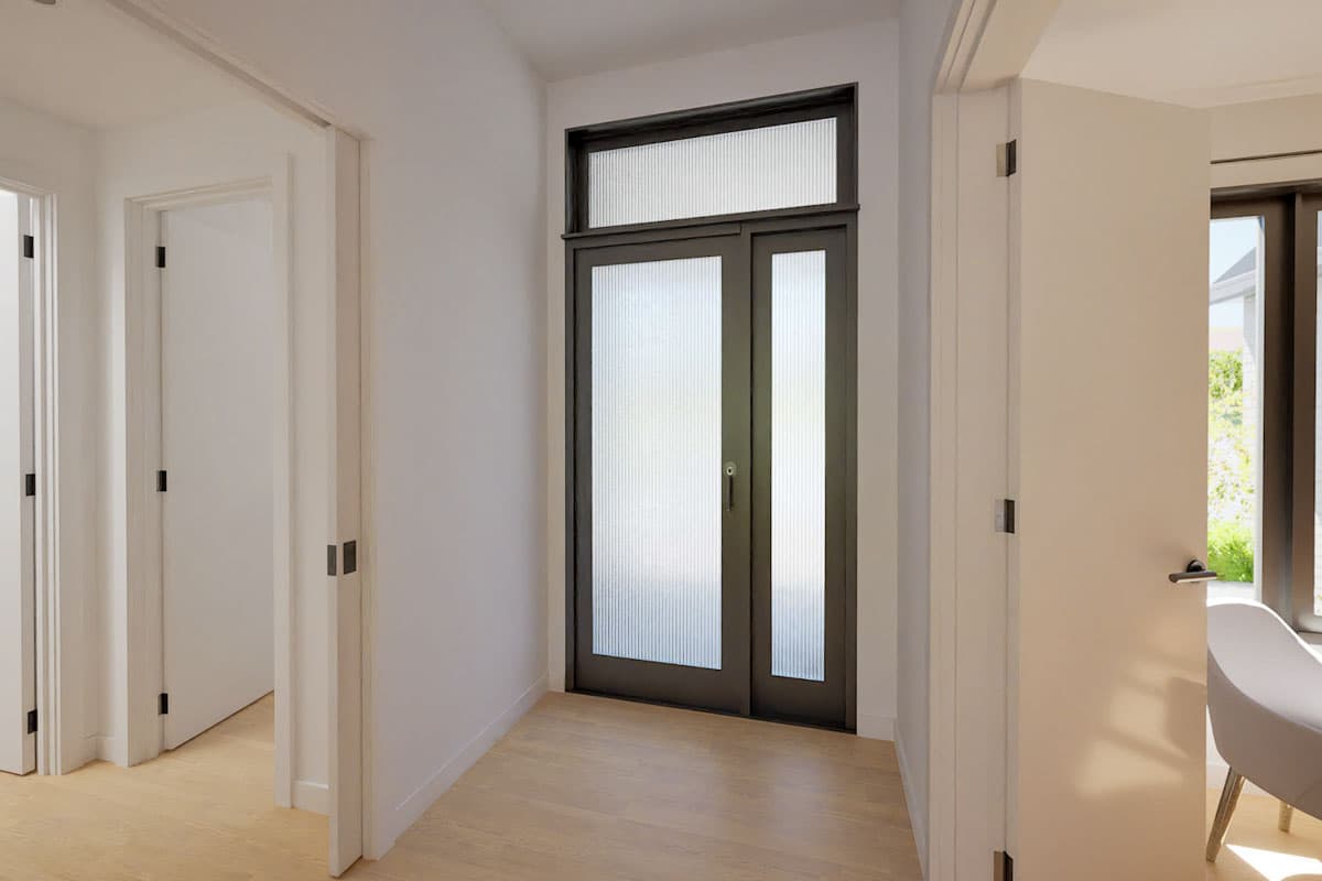 Interior view of house plan entry with double doors featuring frosted glass panels and transom window. Wood floors visible.