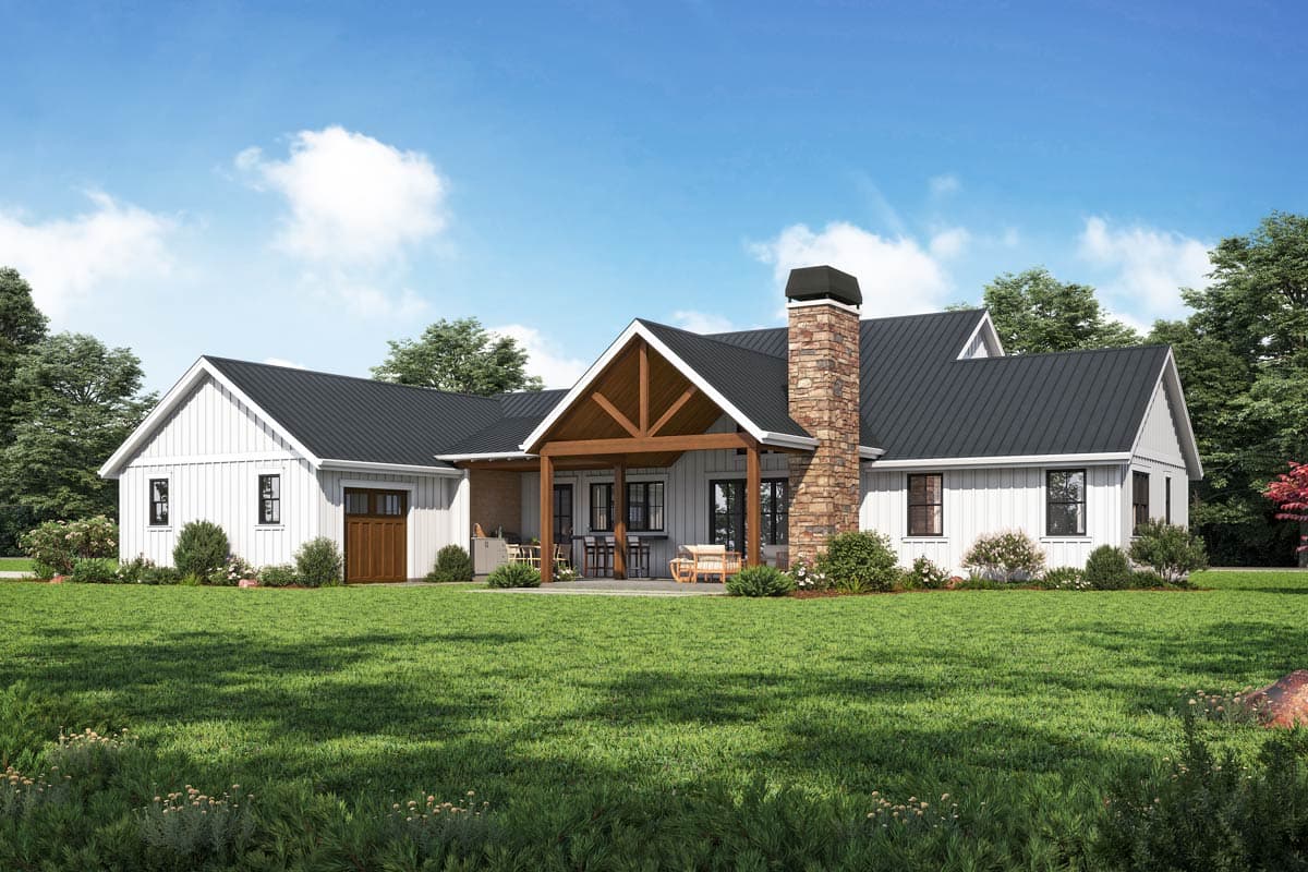 Modern Farmhouse house plan exterior with a prominent stone chimney, covered porch with exposed beams, and a side-facing garage.