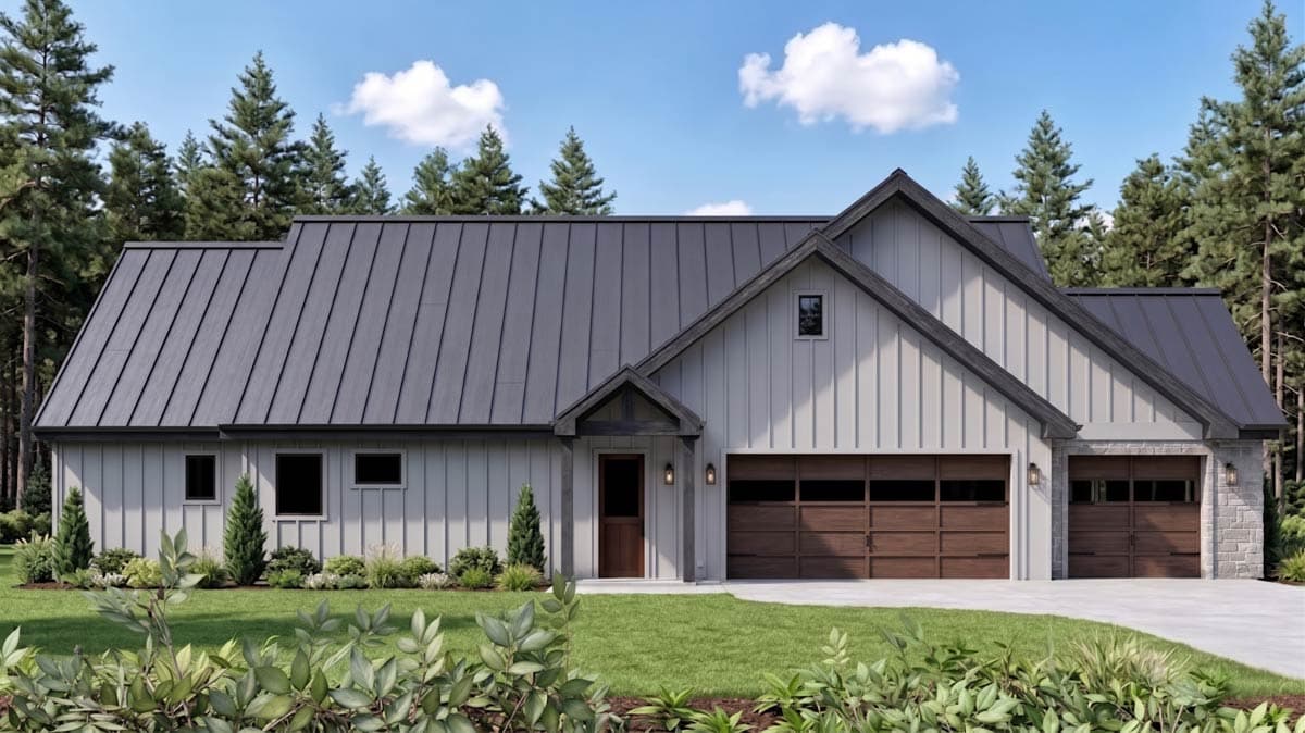 Modern Farmhouse exterior with vertical siding, metal roof, stone accents, covered entry, and a triple garage.