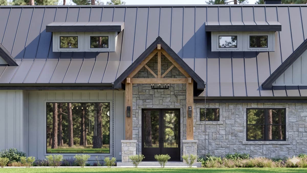 House plan exterior, Modern Farmhouse style, two stories, standing seam metal roof, stone accents, and gabled dormers.