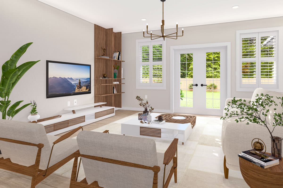 Living room with wall-mounted TV, wooden shelving unit, modern coffee table, and double doors leading outdoors.