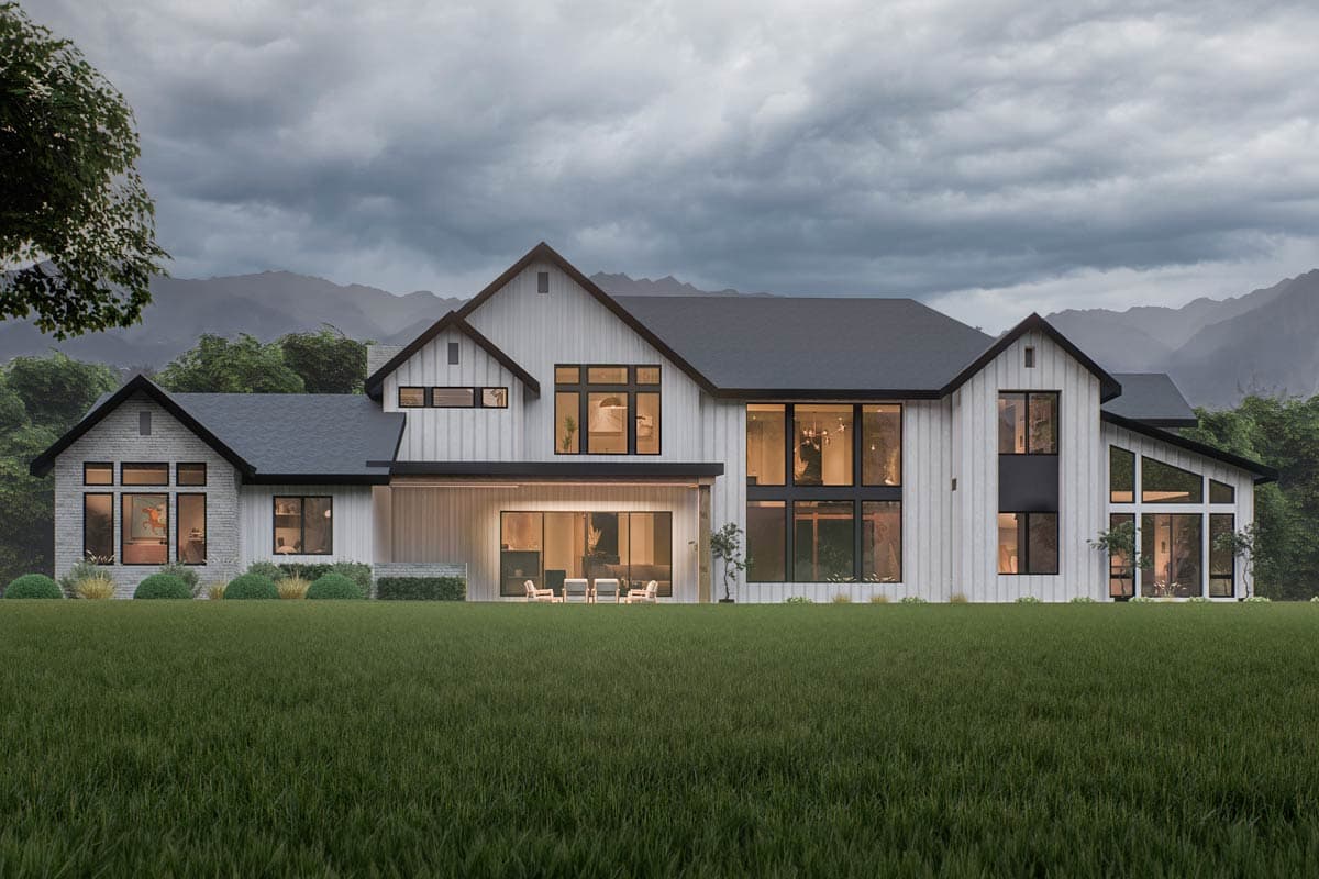 Modern Farmhouse house plan exterior with white vertical siding, gables, and large black-framed windows.