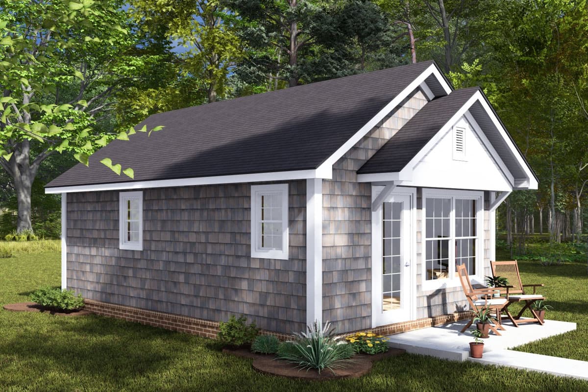 House plan exterior: One-story cottage with shingle siding, gable dormer, and brick foundation. Features a covered entry with French doors.