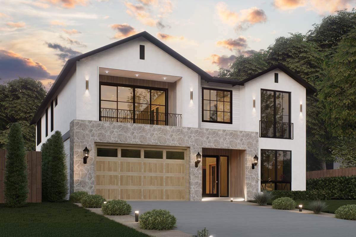 Modern Farmhouse house plan exterior with two stories, stone veneer accents, and a balcony. Features a two-car garage and gabled roof.