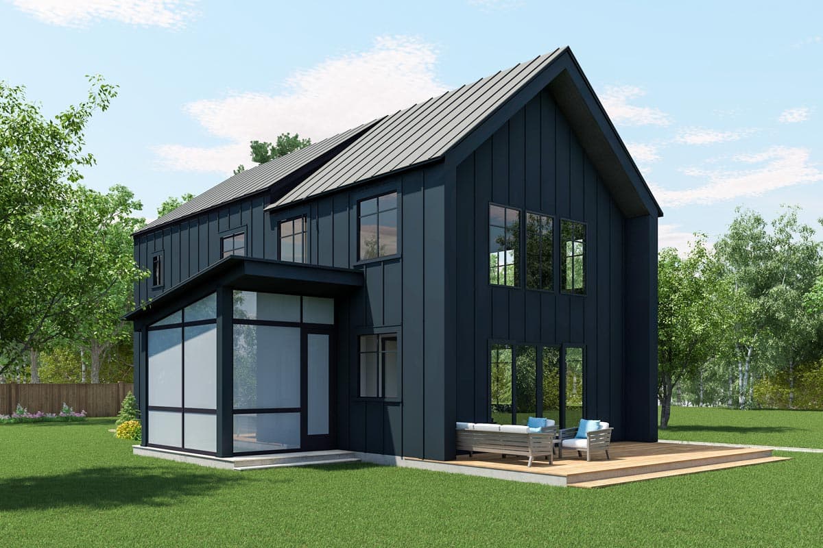 House plan exterior featuring a two-story modern design with dark metal siding, gable roof, and a glass sunroom addition.