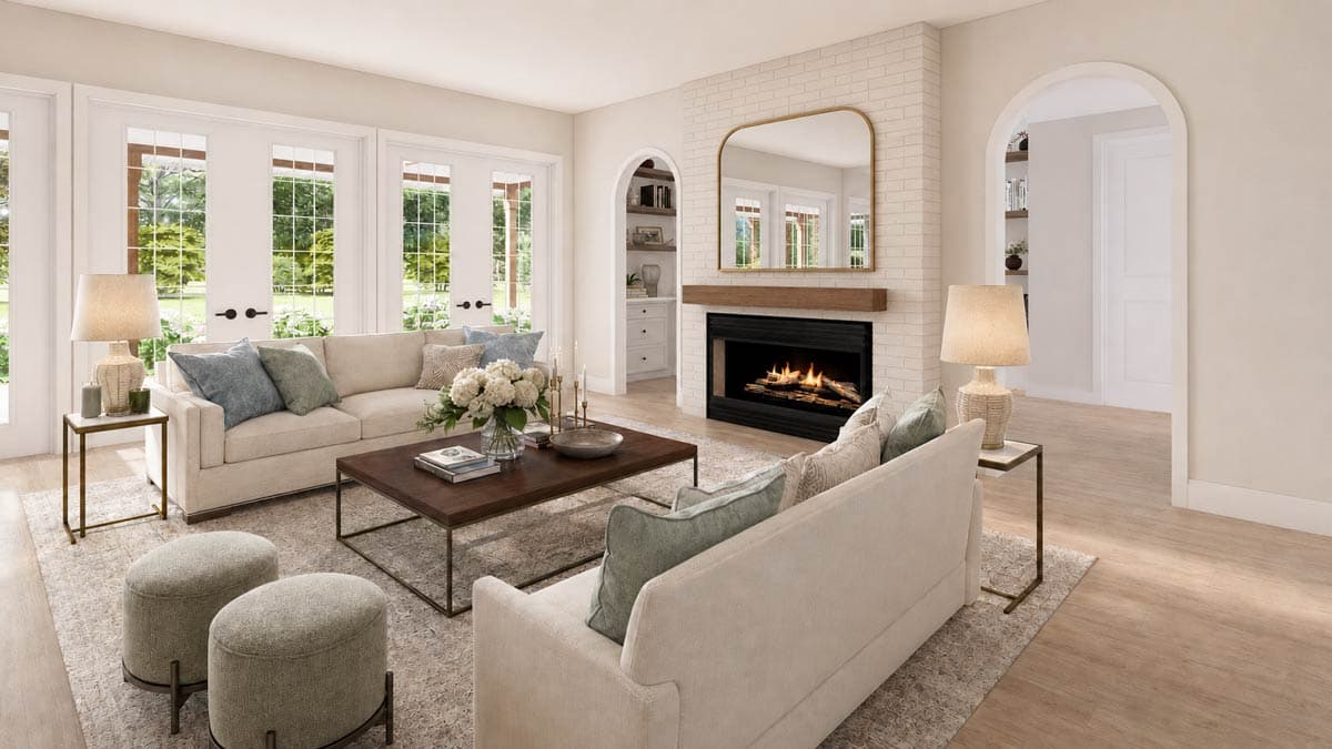 Living room with sectional sofa, fireplace, TV, wood-beamed ceiling, and French doors.