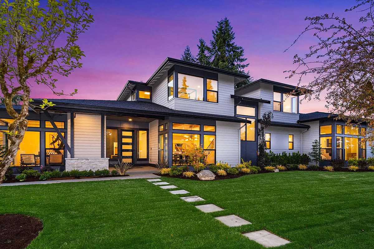 House plan exterior. Two-story modern home with large windows, flat roof, and an open layout. Includes a covered entryway.