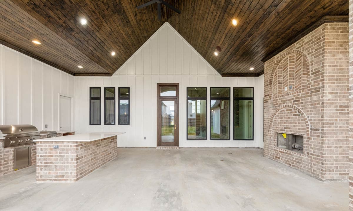 Plan 860080MCD: 4-Bed Transitional House Plan with Outdoor Kitchen and Fireplace - 3410 Sq Ft - Image #14 - Contemporary, New American, Transitional, Tudor