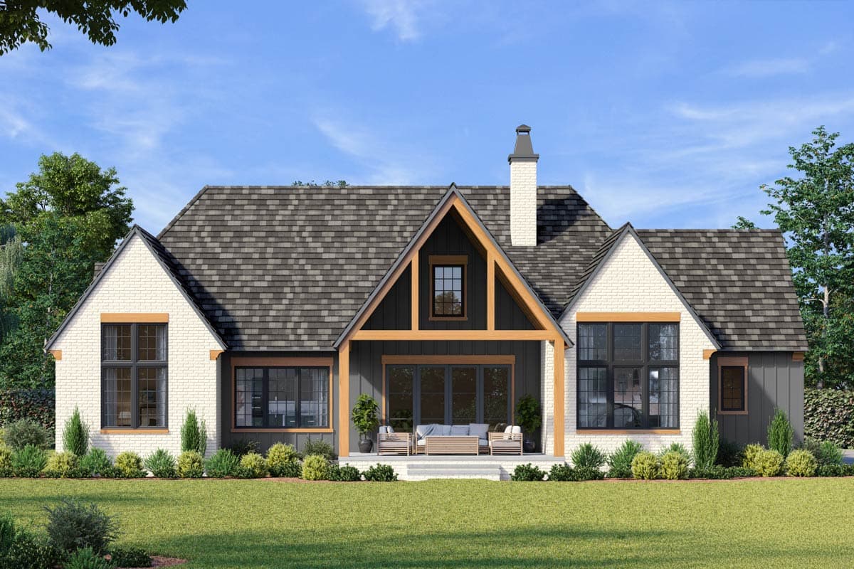 Modern Farmhouse house plan exterior with white brick, dark siding, gables, dormers, and covered patio.