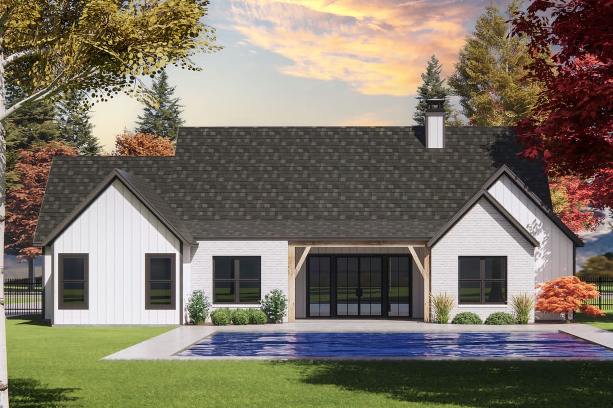 Modern Farmhouse house plan exterior with white brick, board and batten siding, gables, and large sliding glass doors.