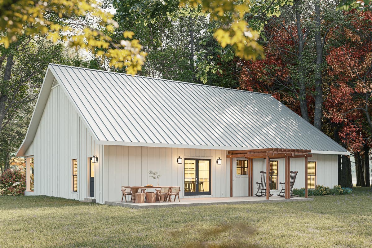 House plan exterior: Modern Farmhouse style, one story, white vertical siding, gable roof, covered patio with pergola, and front door.